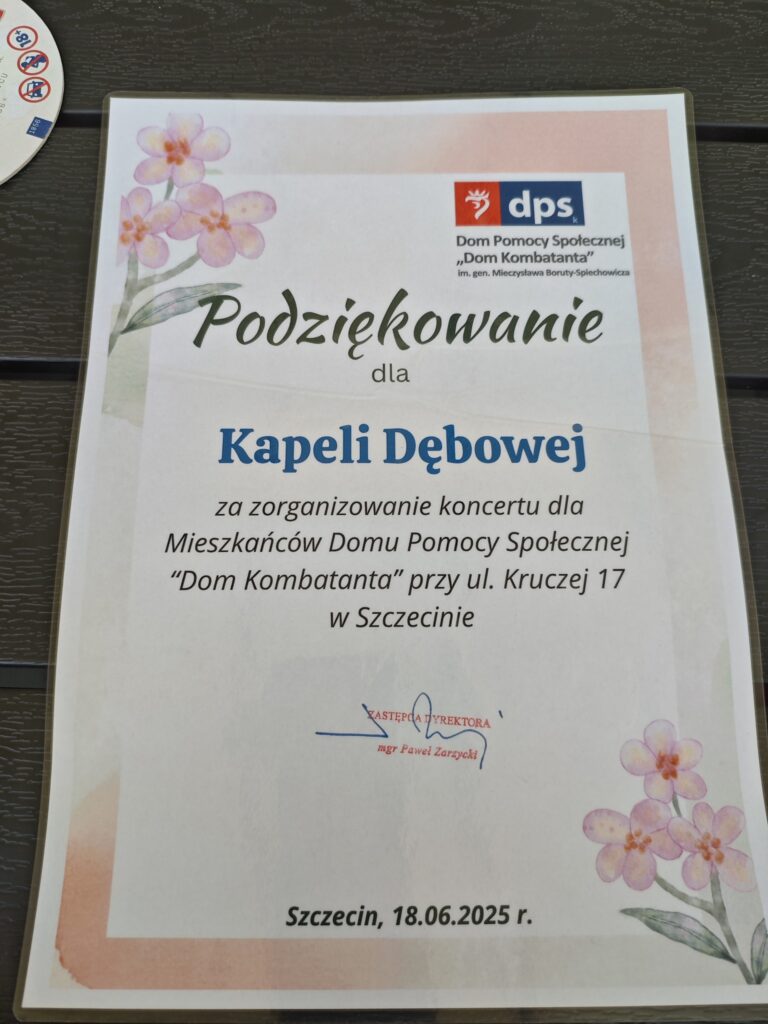 zdjęcie przedstawia dyplom z podziękowaniami dla kapeli Dębowej za zorganizowanie koncertu